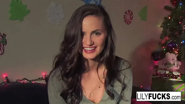 New Lily tells us her horny Christmas wishes before satisfying herself in both holes energy Tube